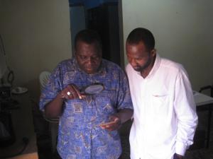 Salou Alassane and Massoud Ali, two of the researchers of the eight at the Mara. They are studying an mss to enter details for next volume of their catalogue.